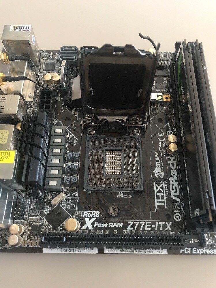 For sale ASRock Z77E-ITX LGA 1155 motherboard with 16GB RAM and BCM4352 PCIe card